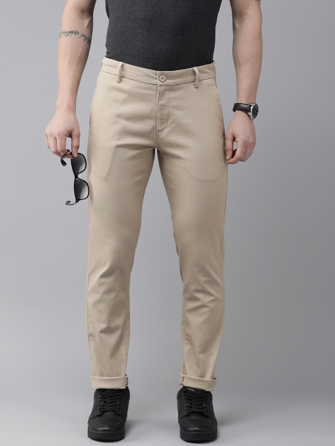 

U.S. Polo Assn. Men Solid Mid-Rise Austin Trim Fit Regular Trousers, Beige