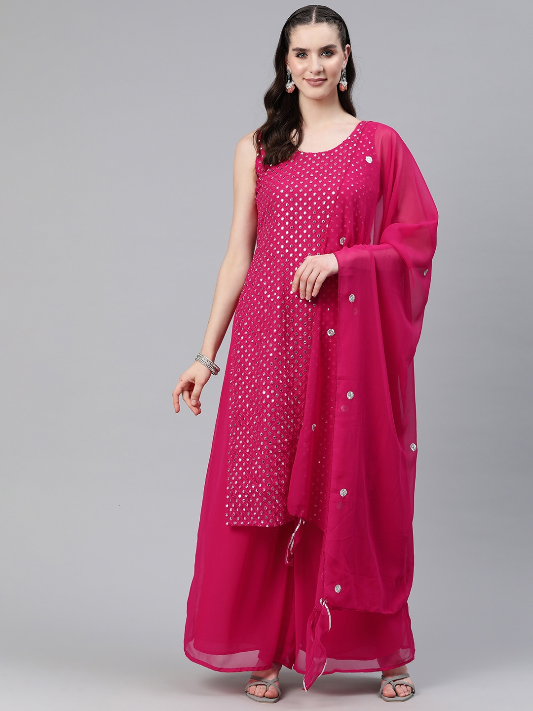 

Readiprint Fashions Women Magenta Embroidered Regular Mirror Work Kurta with Palazzos & With Dupatta
