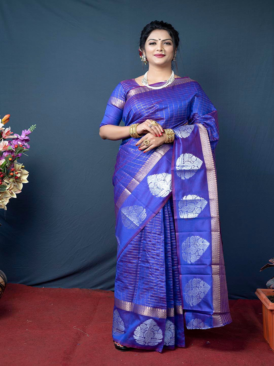 

Mitera Blue & Silver-Toned Ethnic Motifs Woven Design Zari Saree