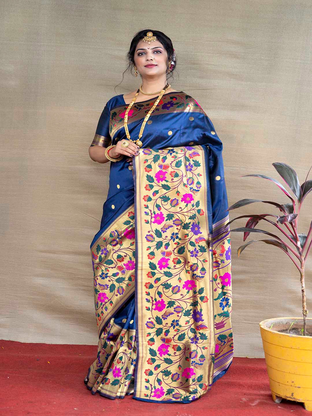 

Mitera Blue & Pink Ethnic Motifs Woven Design Zari Art Silk Saree