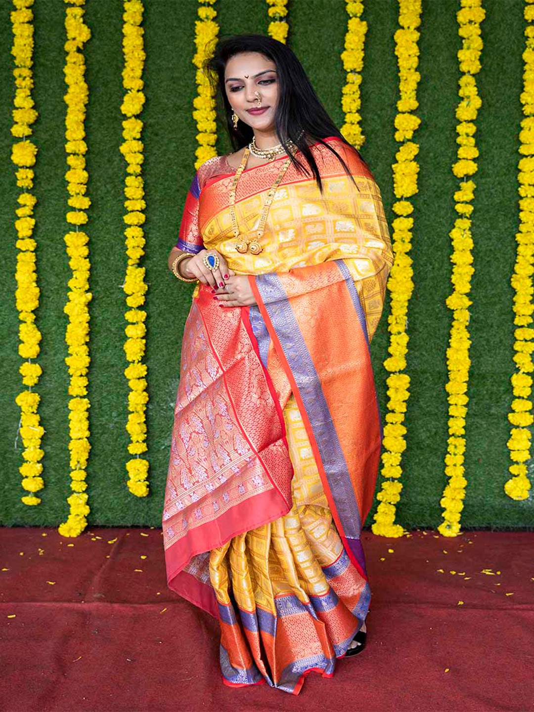 

Mitera Yellow & Pink Ethnic Motifs Woven Design Zari Saree