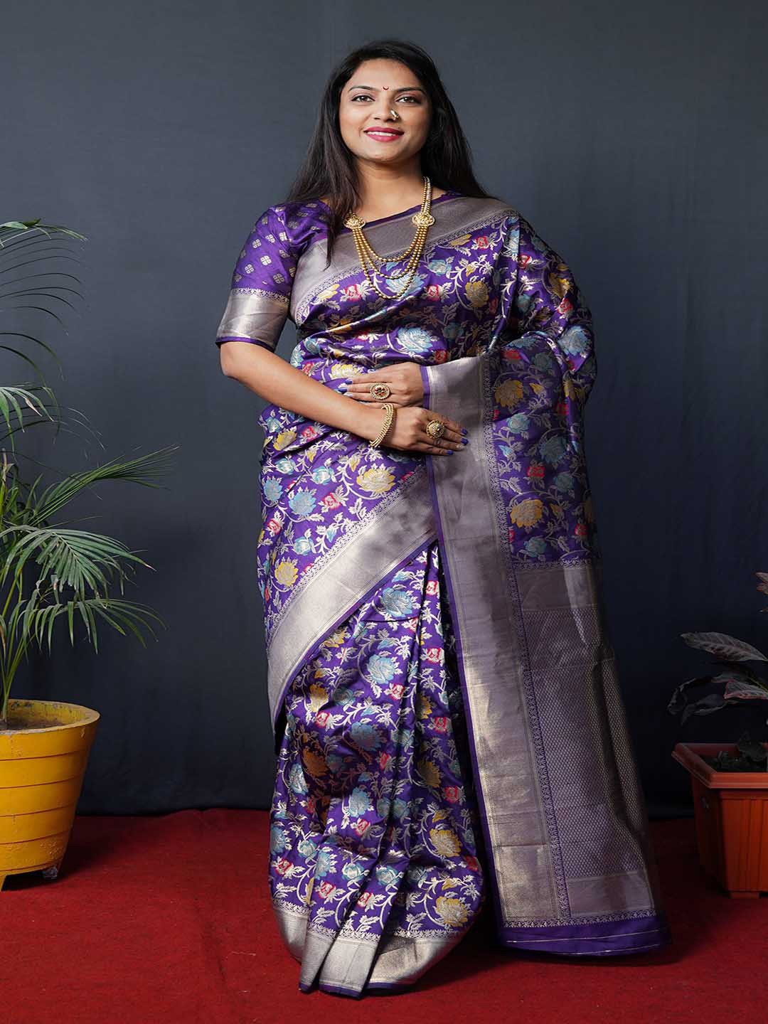 

Mitera Purple & Red Ethnic Motifs Woven Design Zari Banarasi Silk Saree
