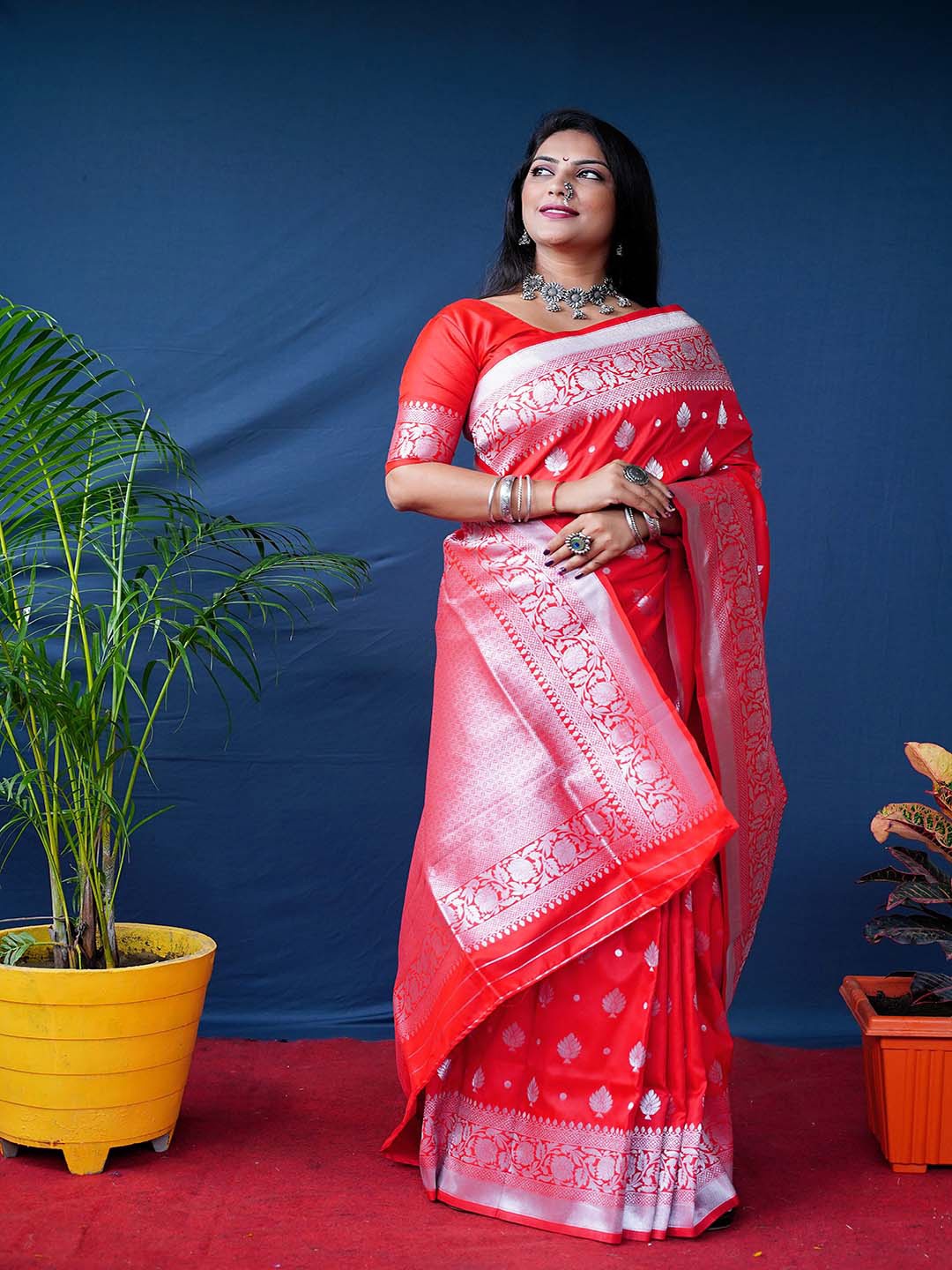 

Mitera Red & Silver-Toned Ethnic Motifs Woven Design Zari Saree