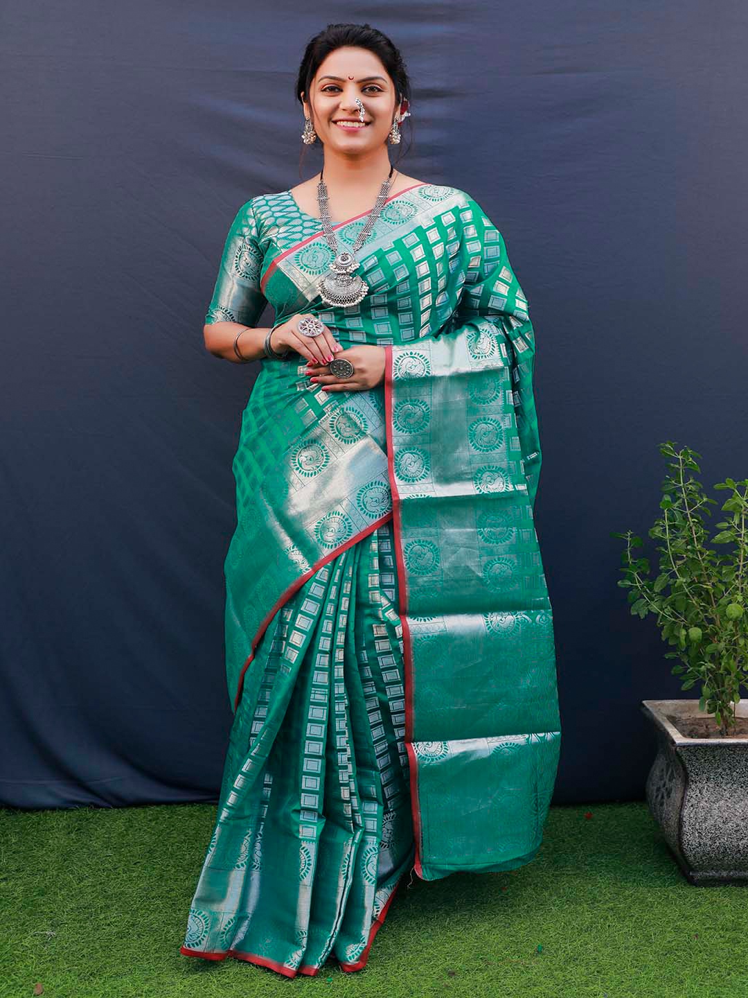 

Mitera Green & Silver-Toned Ethnic Motifs Woven Design Zari Kanchipuram Silk Saree
