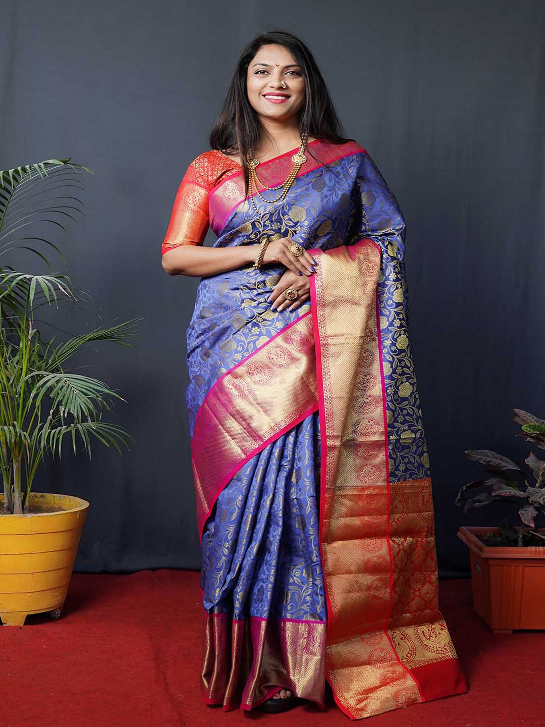 

Mitera Blue & Red Ethnic Motifs Woven Design Zari Kanchipuram Silk Saree