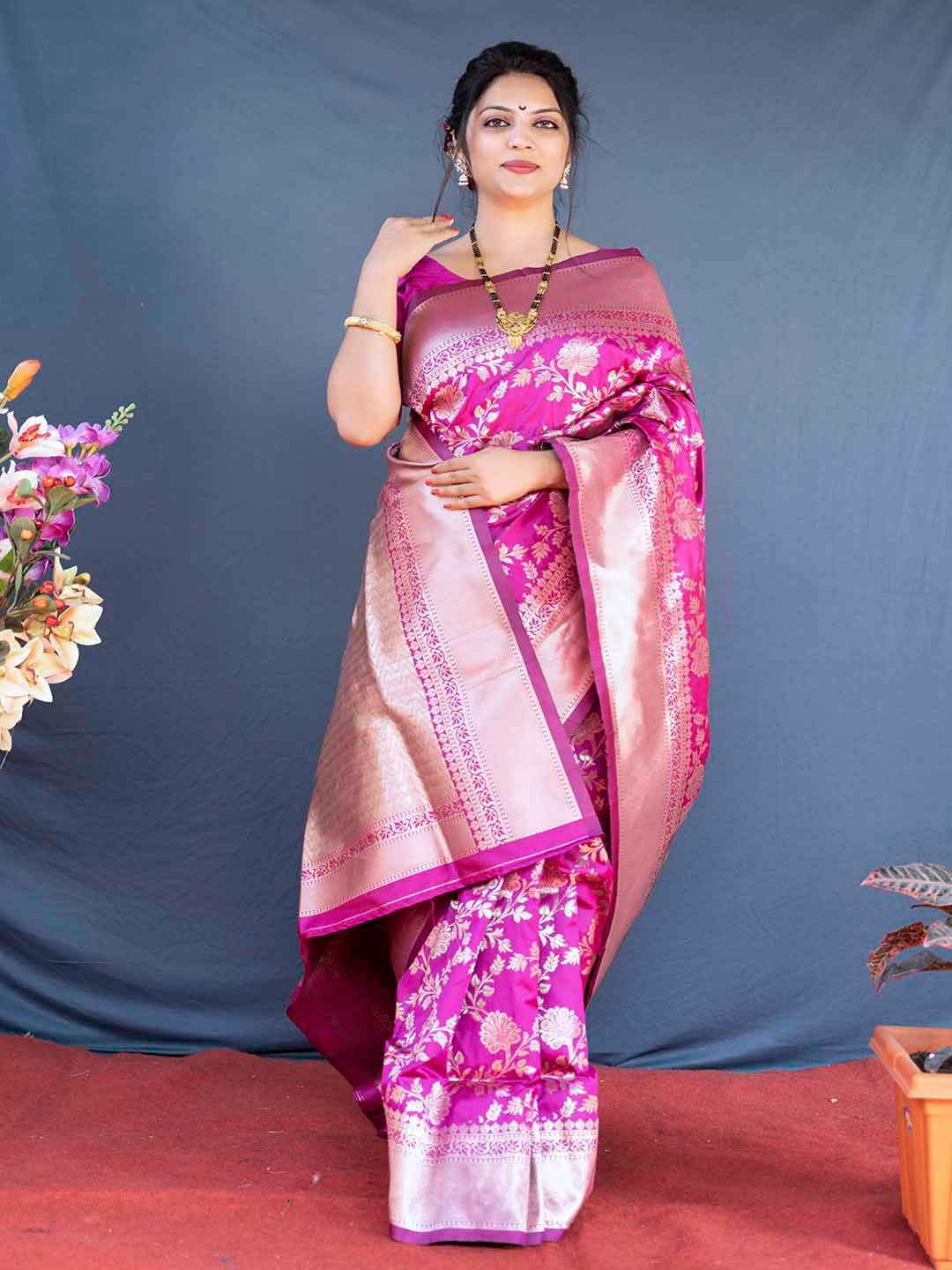 

Mitera Pink & Gold-Toned Ethnic Motifs Woven Design Zari Art Silk Banarasi Saree