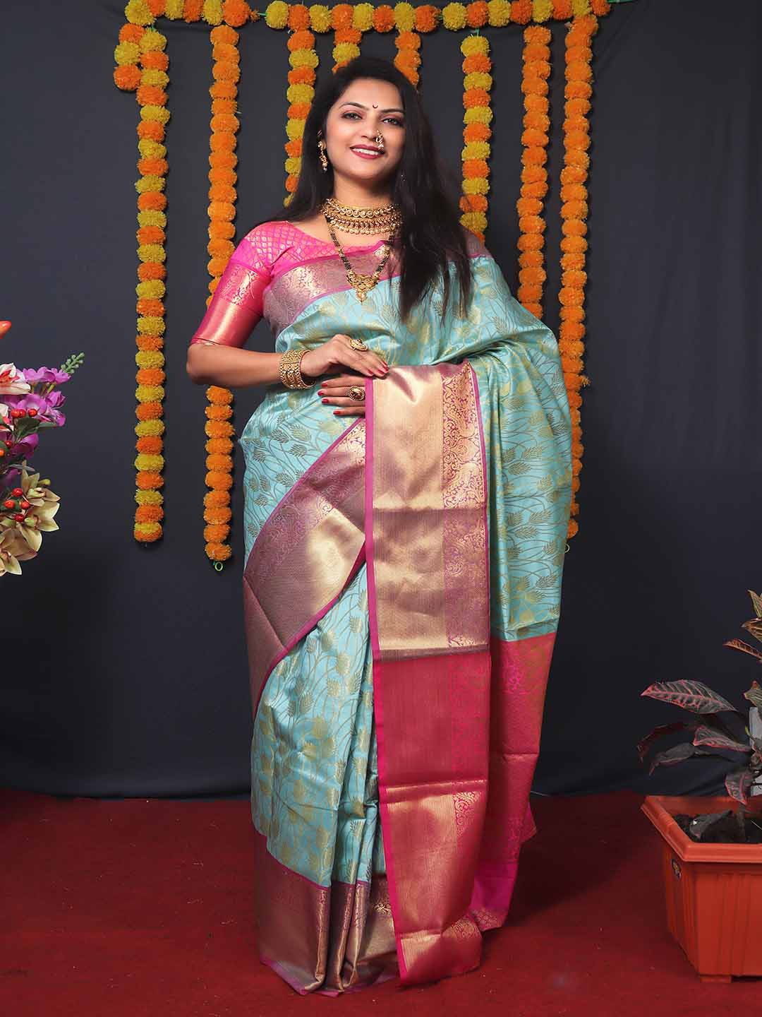 

Mitera Turquoise Blue & Pink Woven Design Kanchipuram Zari Saree