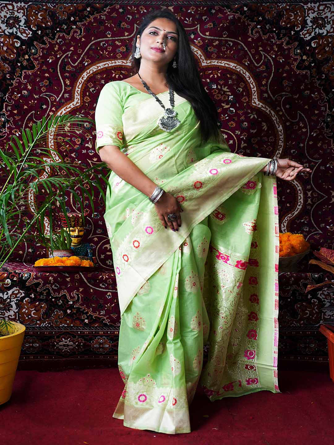 

Mitera Green & Pink Ethnic Motif Woven Design Zari Saree