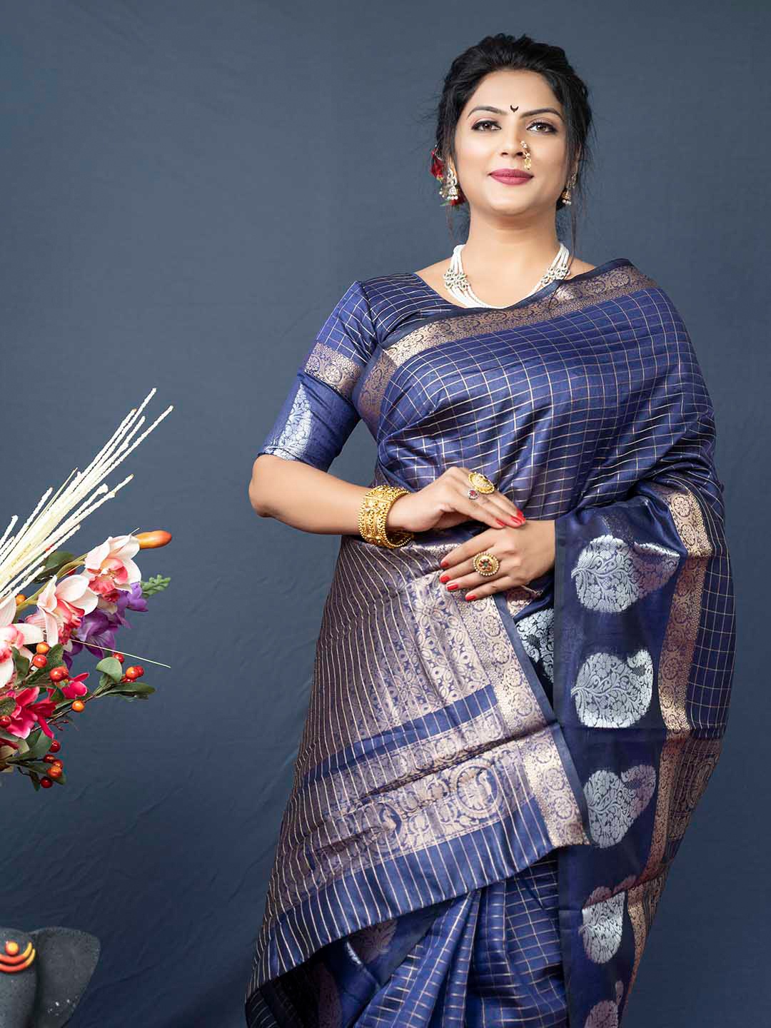 

Mitera Navy Blue & Gold Ethnic Motif Woven Design Zari Saree