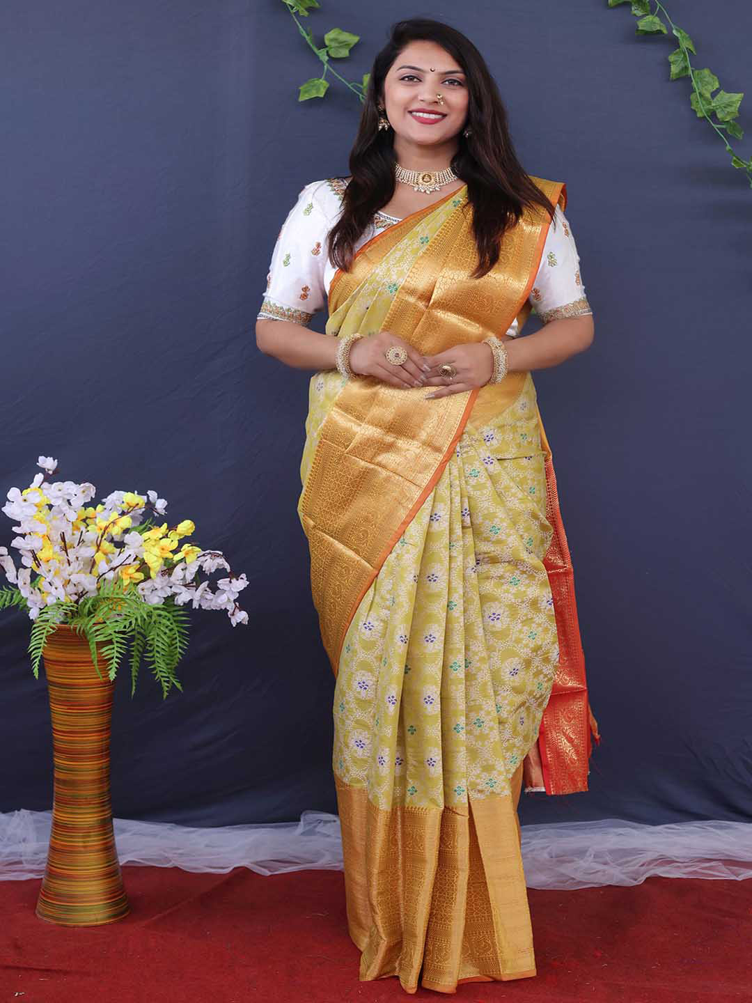 

Mitera Yellow & Gold-Toned Ethnic Motif Printed Zari Saree