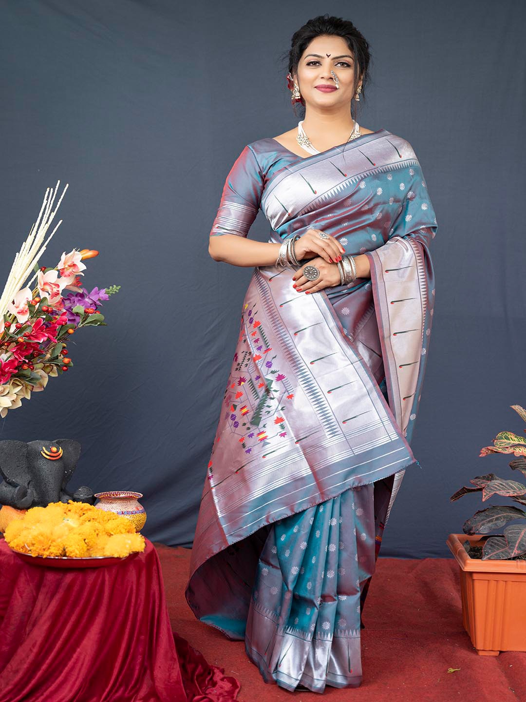 

Mitera Grey & Red Floral Woven Design Zari Paithani Saree