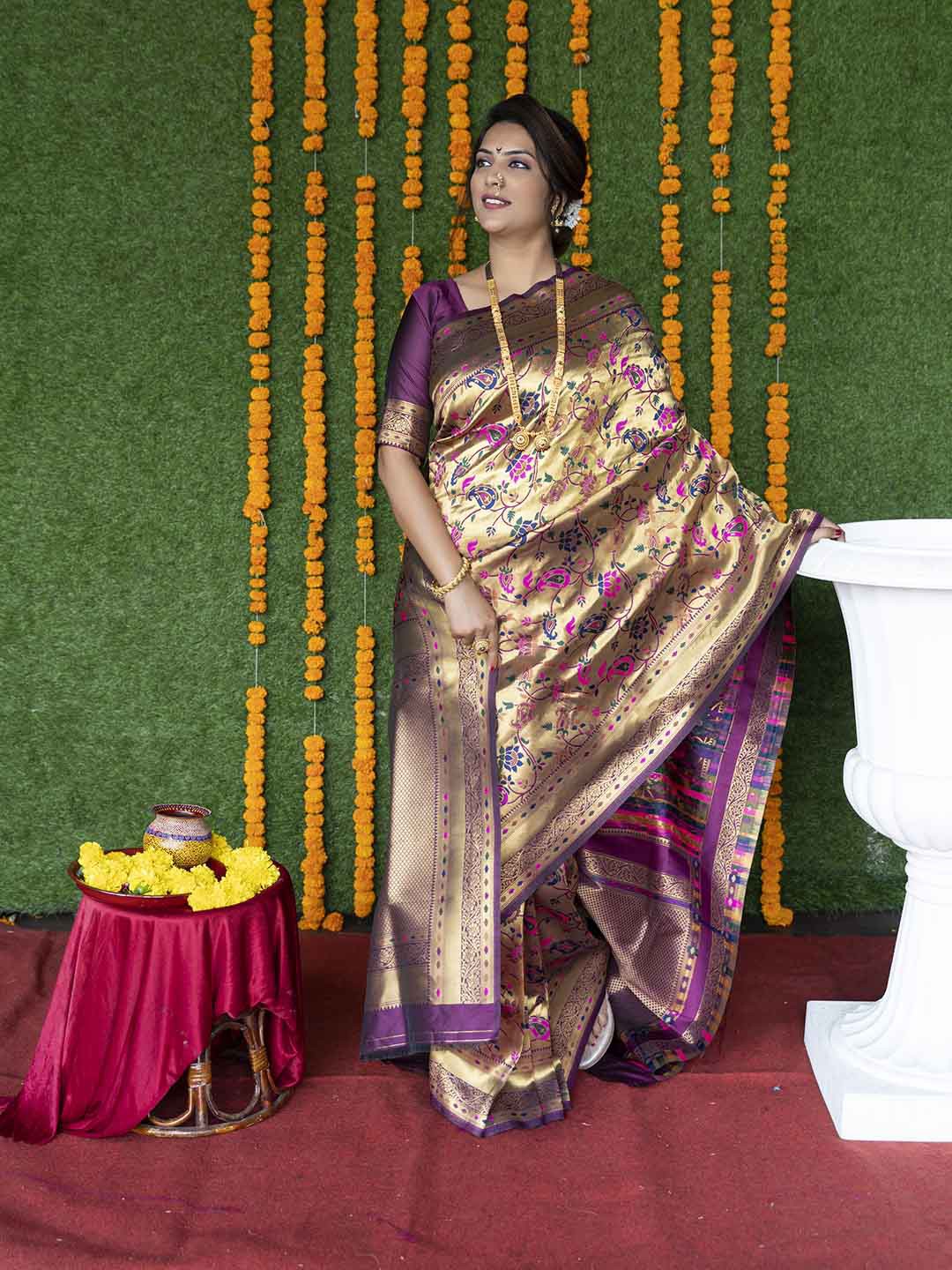 

Mitera Purple & Pink Ethnic Motifs Woven Design Zari Banarsai Saree