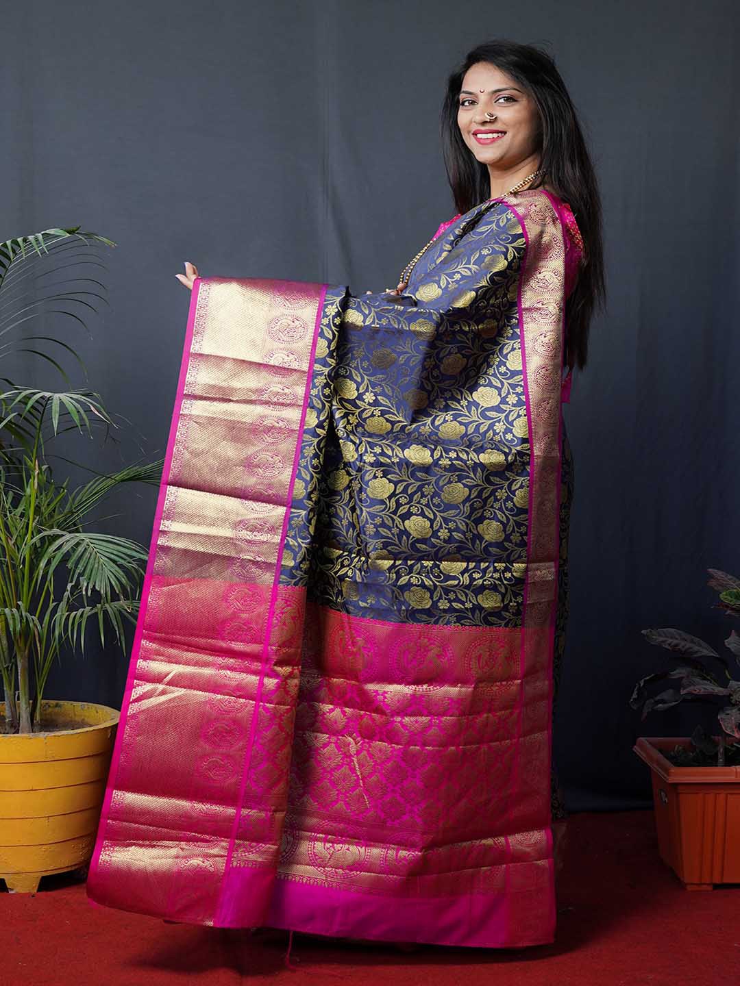 

Mitera Navy Blue & Pink Floral Woven Design Zari Pure Kanchipuram Art Silk Saree