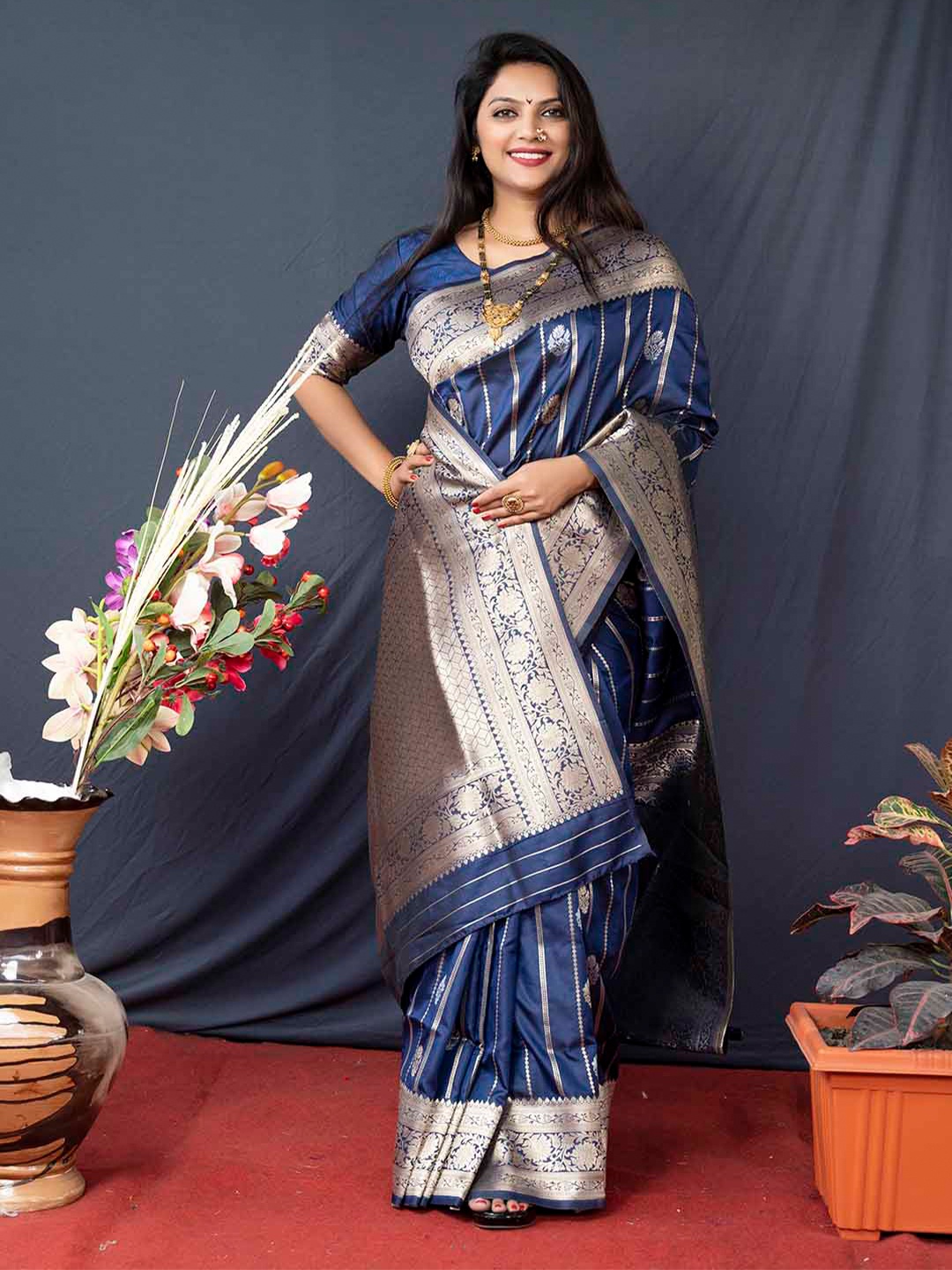 

Mitera Blue & Gold-Toned Ethnic Motifs Woven Design Zari Art Silk Banarasi Saree