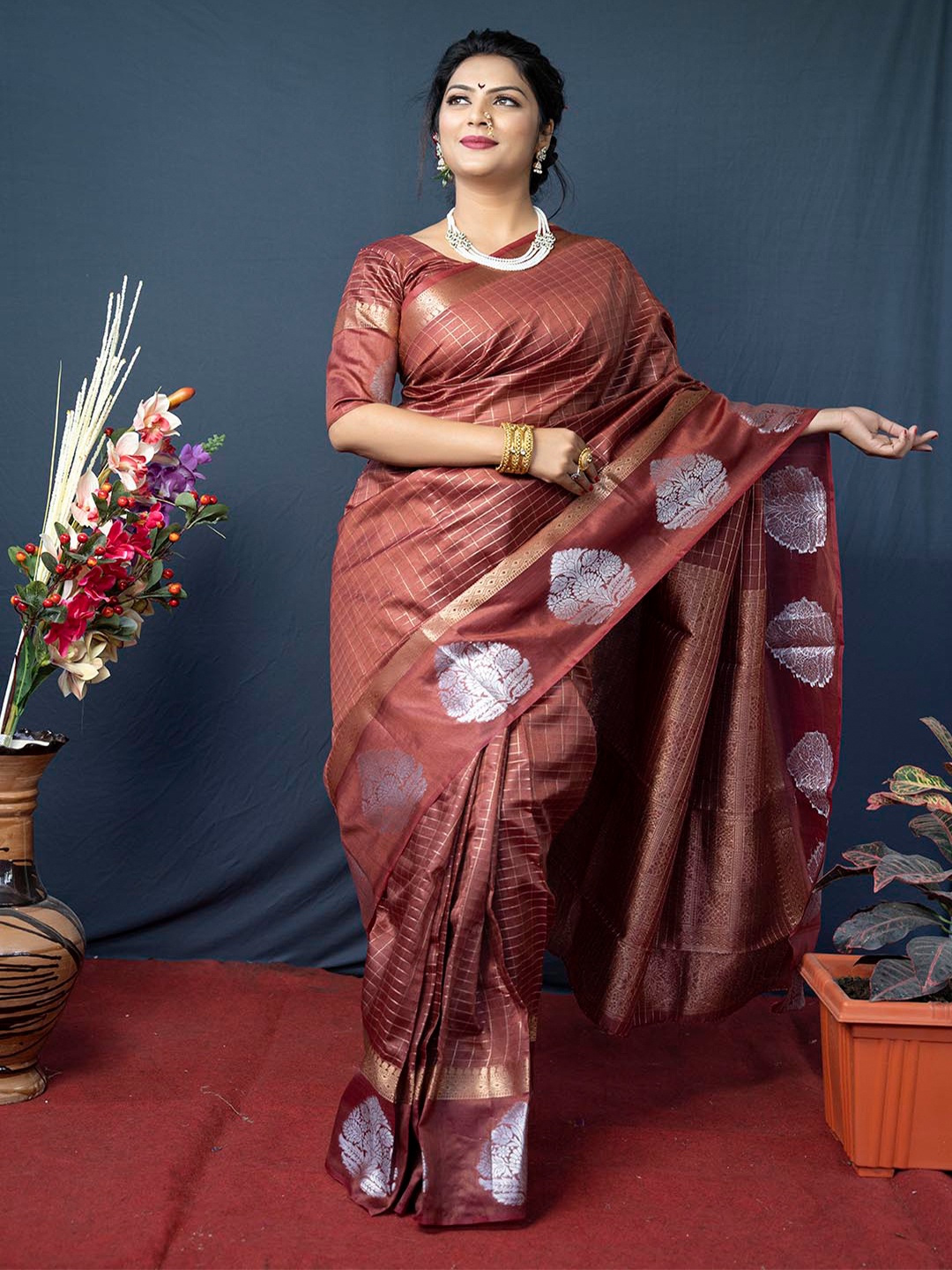 

Mitera Maroon & Silver-Toned Ethnic Motifs Woven Design Zari Saree