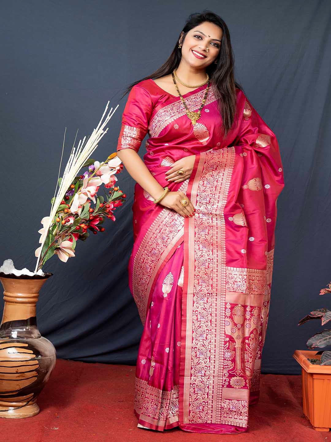 

Mitera Pink & Gold-Toned Ethnic Motifs Woven Design Zari Banarasi Saree