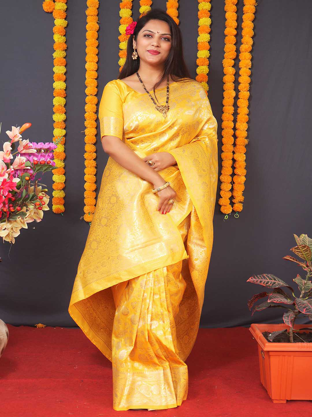 

Mitera Yellow & Gold-Toned Floral Woven Design Zari Art Silk Saree
