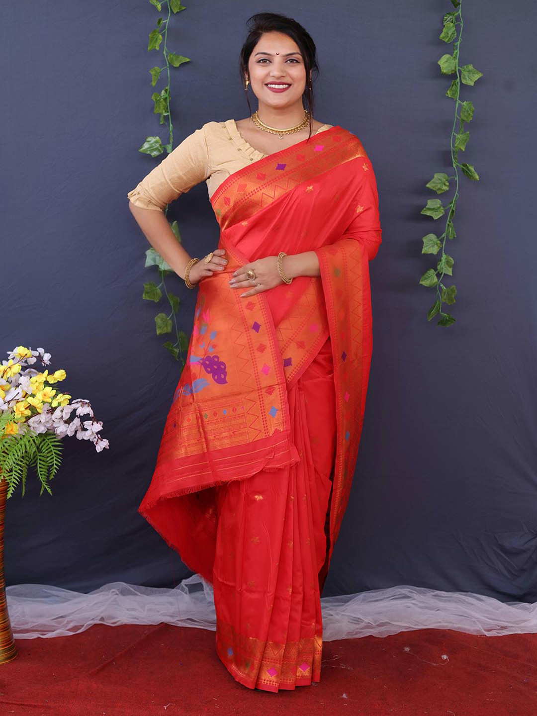 

Mitera Red Ethnic Motifs Woven Design Zari Saree