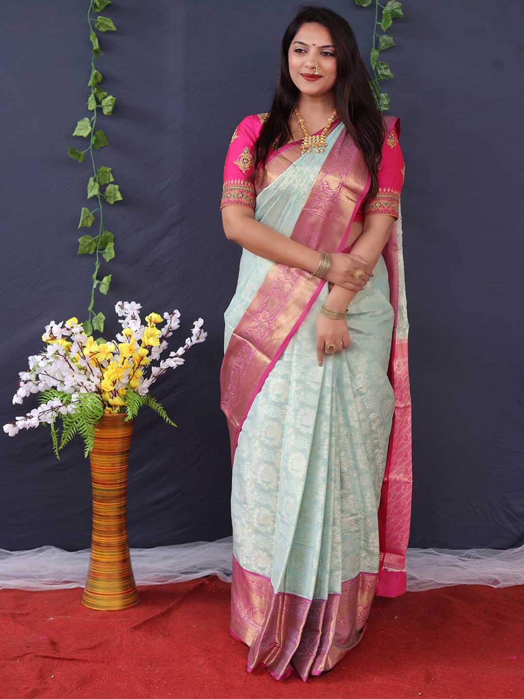 

Mitera Blue & Pink Ethnic Motifs Woven Design Zari Art Silk Saree