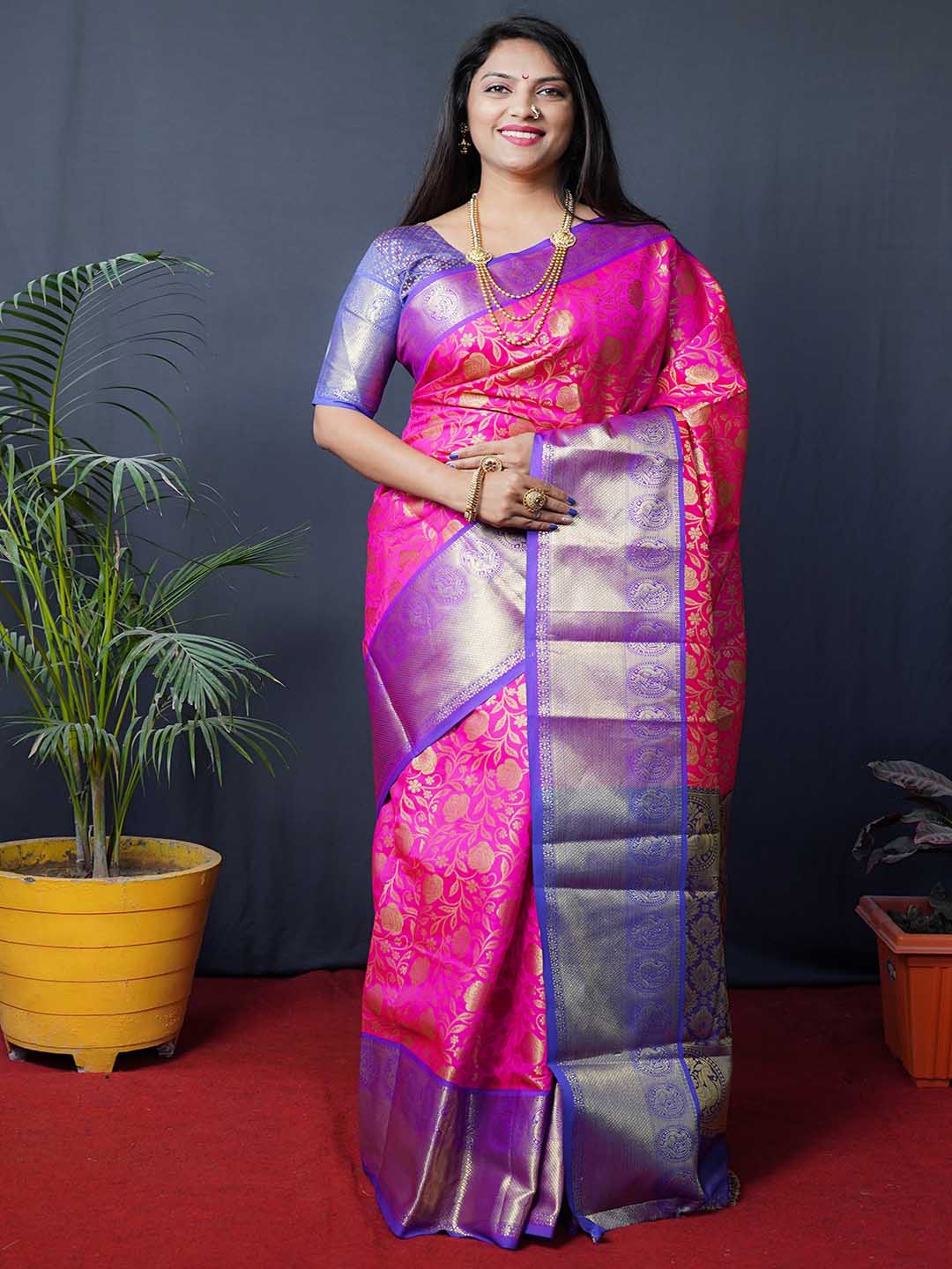 

Mitera Pink & Blue Floral Woven Design Zari Art Silk Kanjeevaram Saree
