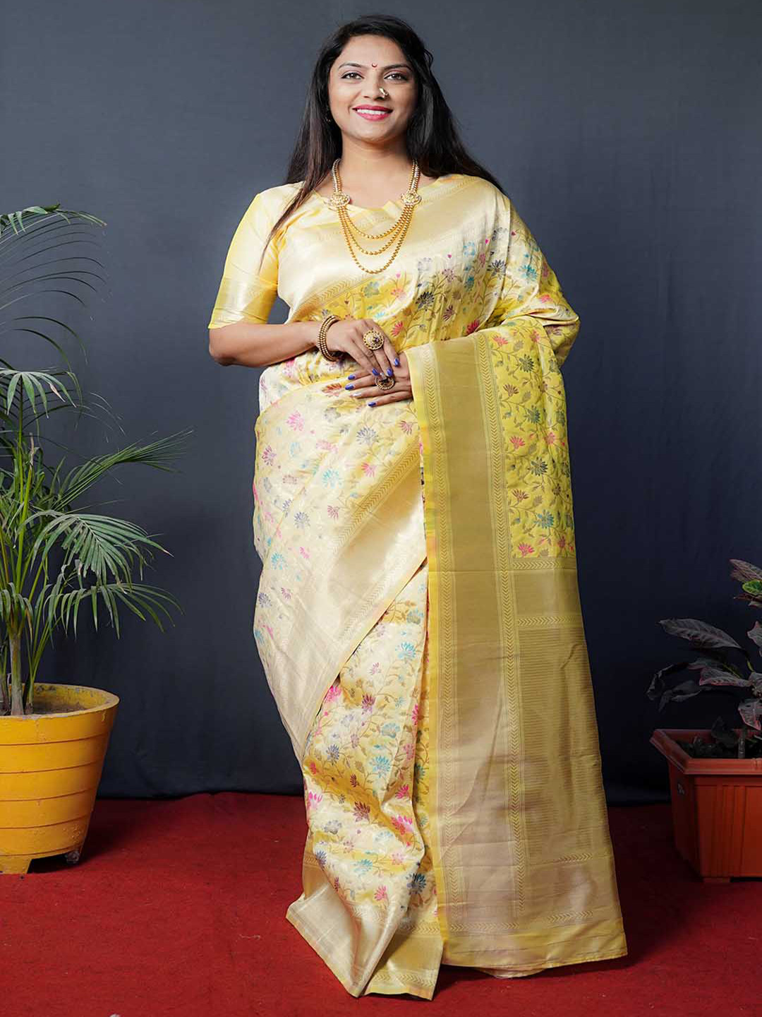 

Mitera Yellow & Gold-Toned Floral Woven Design Zari Art Silk Saree