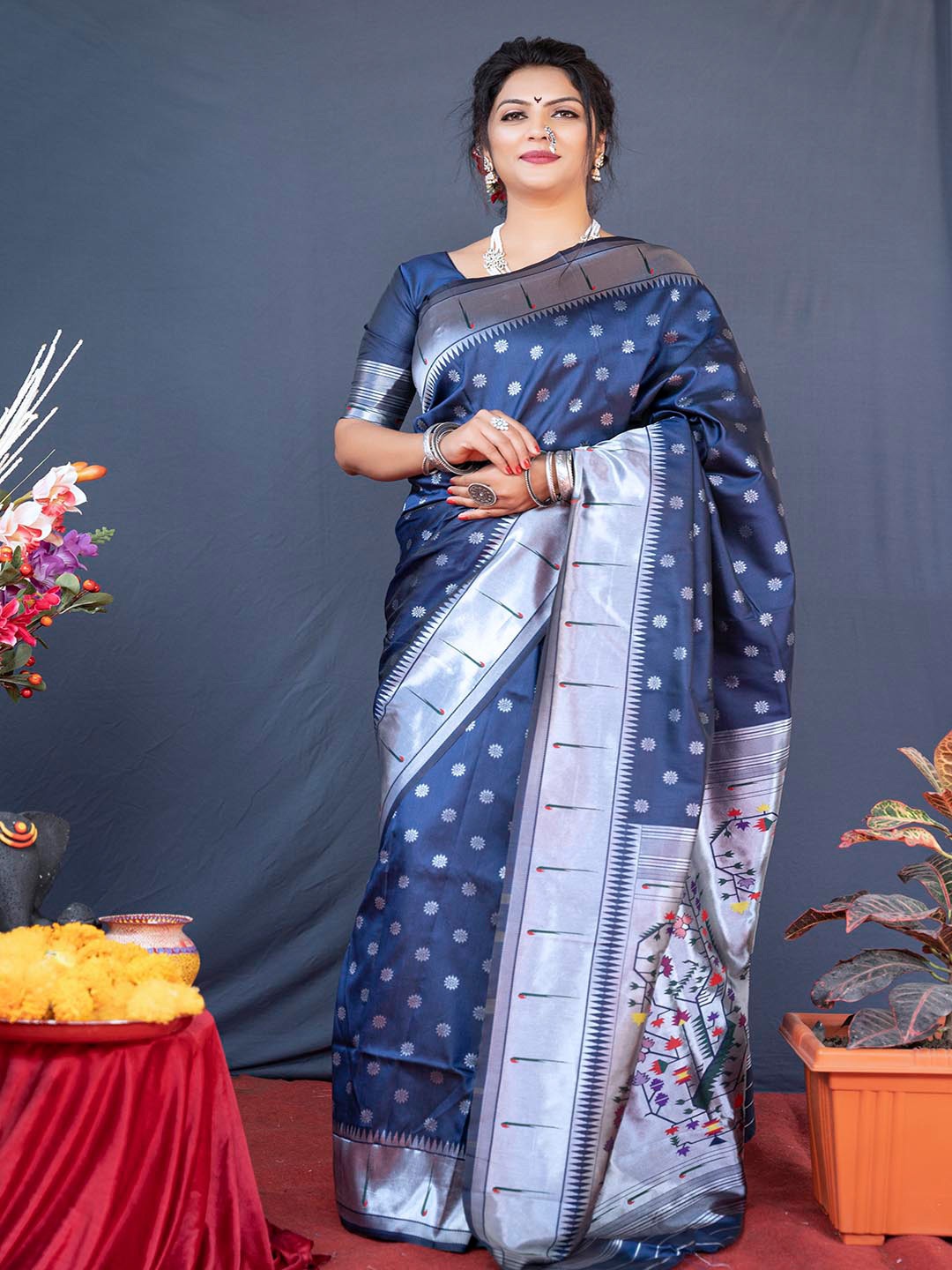 

Mitera Navy Blue & Silver-Toned Ethnic Motifs Woven Design Zari Art Silk Saree