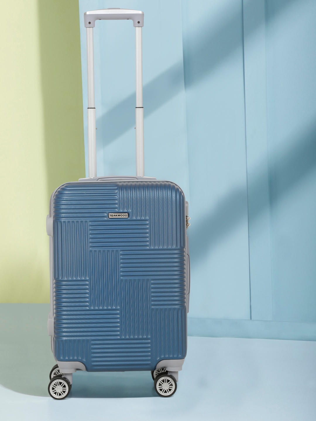 

Teakwood Leathers Textured Hard-Sided 360-Degree Rotation Cabin Trolley Bag- 55 CM, Blue
