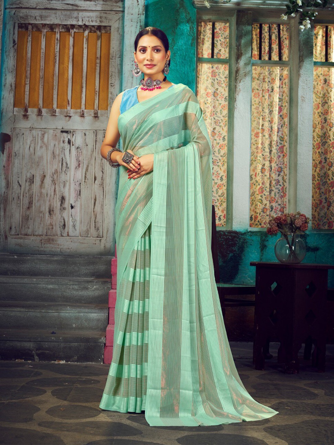 

FLOURIOUS Striped Weightless Pure Georgette Saree, Sea green