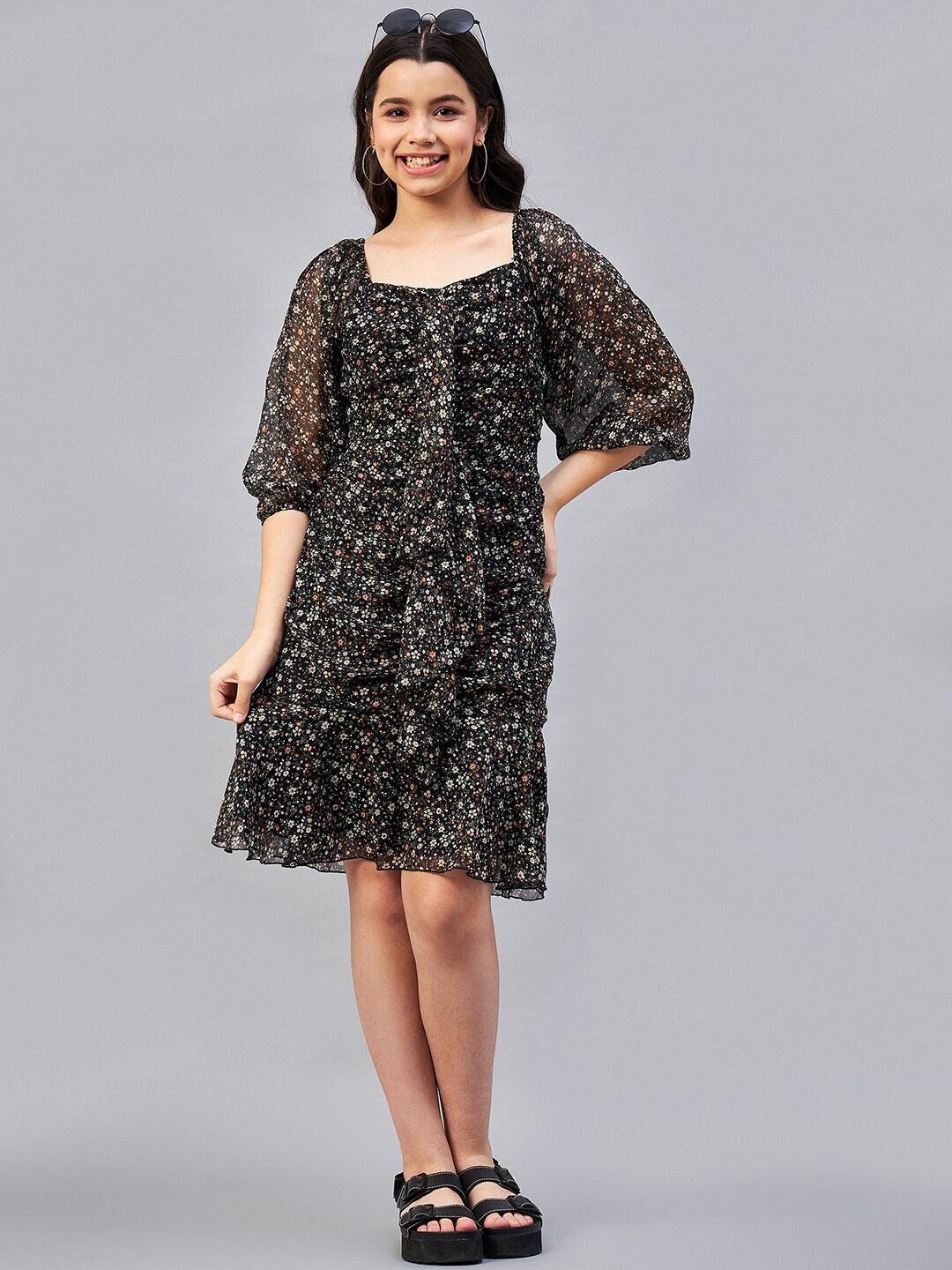 

Antheaa Girls Black Floral Printed Puff Sleeves Ruffles A-Line Dress