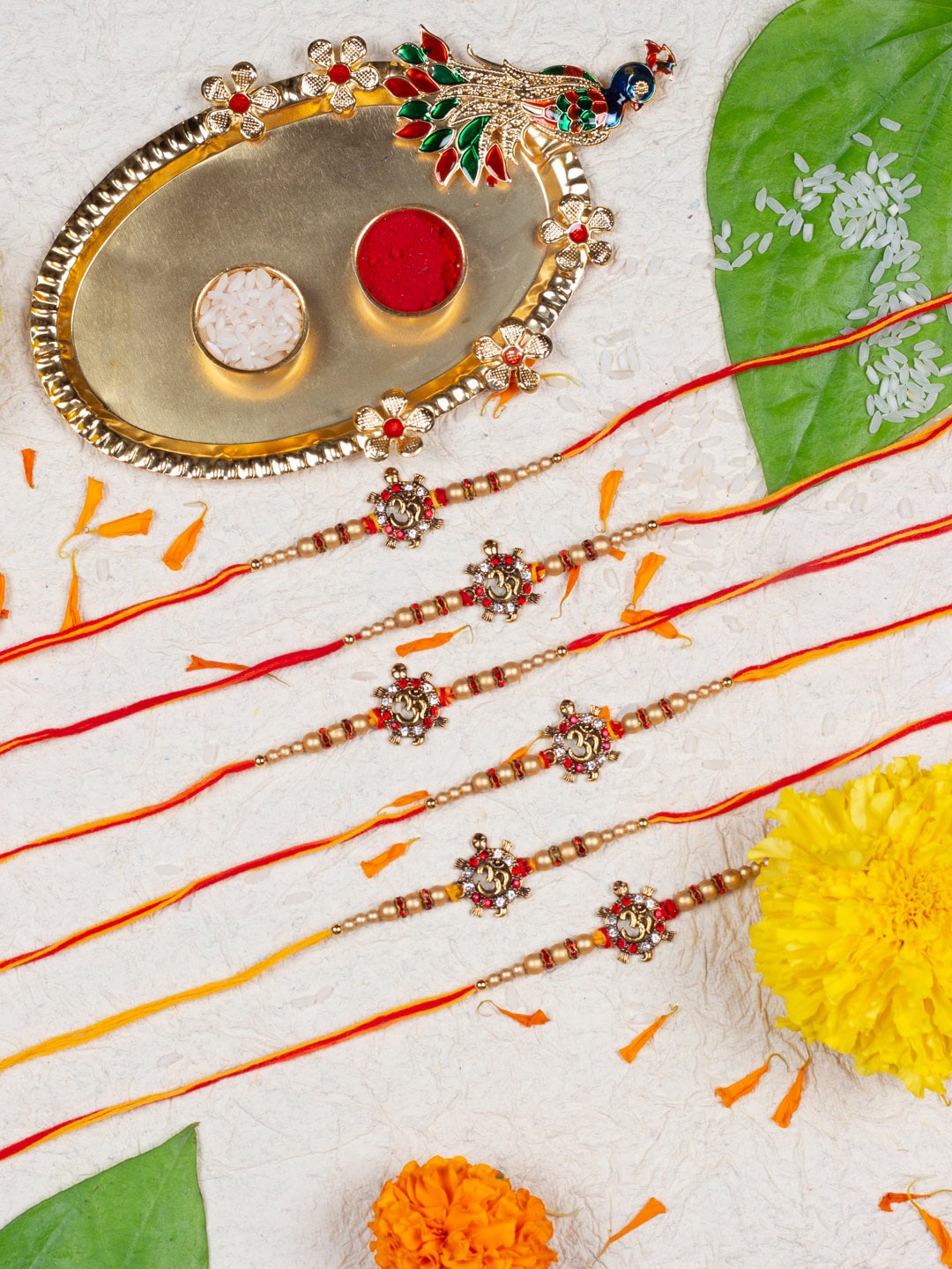 

AccessHer Set Of 6 Stone-Studded & Om Charm Rakhi With Peacock Pooja Thali, Gold