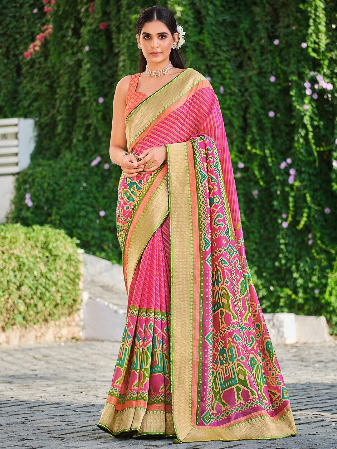 

Anouk Pink & Green Ethnic Motifs Printed Zari Pure Georgette Patola Saree