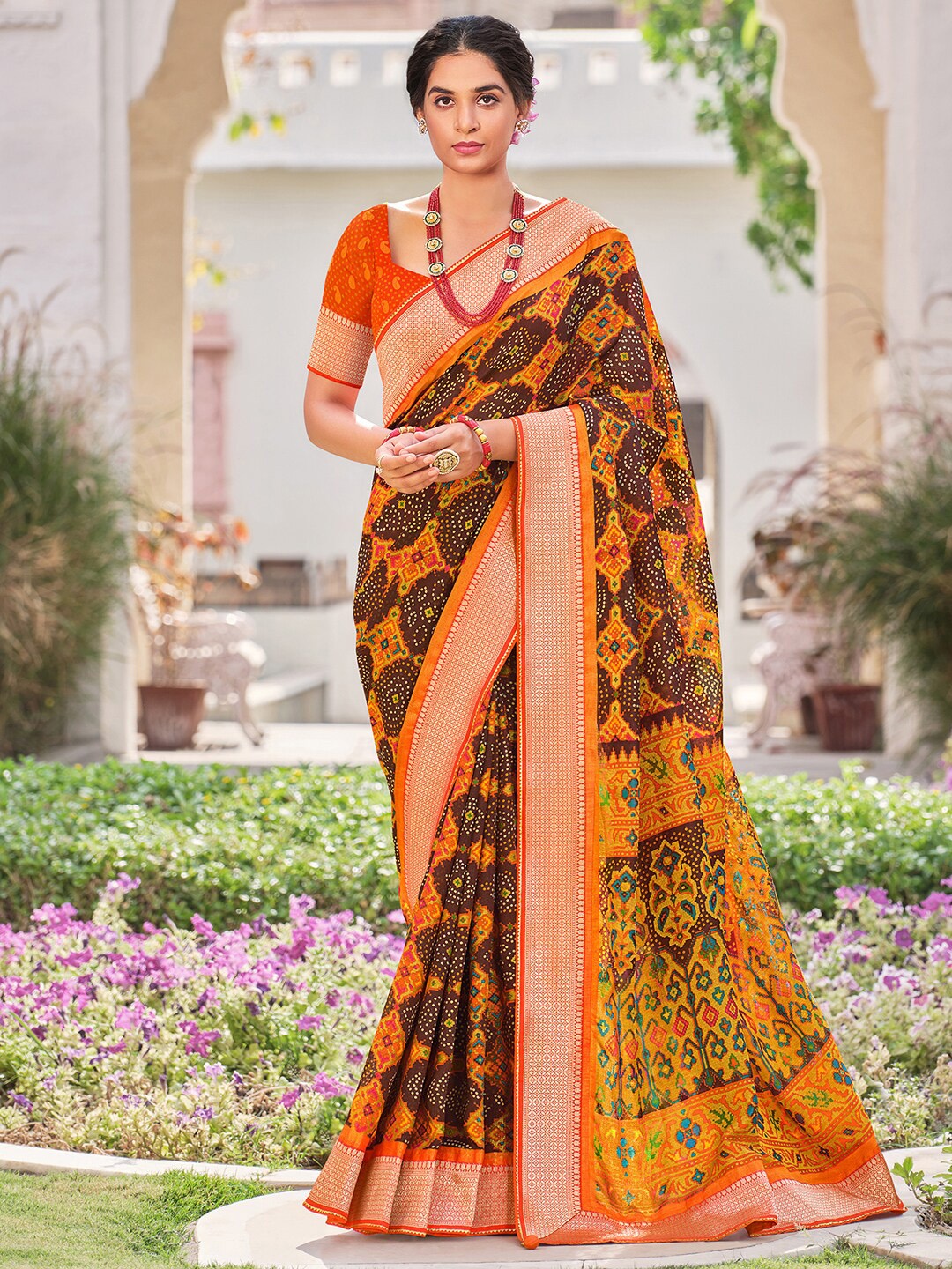 

Anouk Brown & Yellow Printed Zari Pure Georgette Bandhani Saree