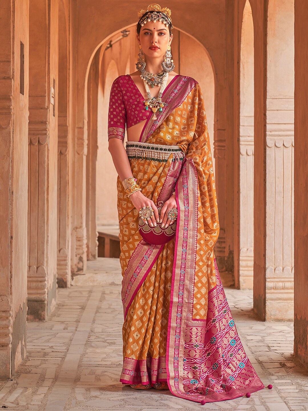 

Anouk Mustard & Pink Ethnic Motifs Woven Design Zari Banarasi Saree