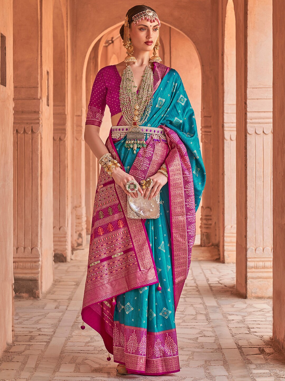 

Anouk Blue & Pink Ethnic Motifs Woven Design Zari Banarasi Saree