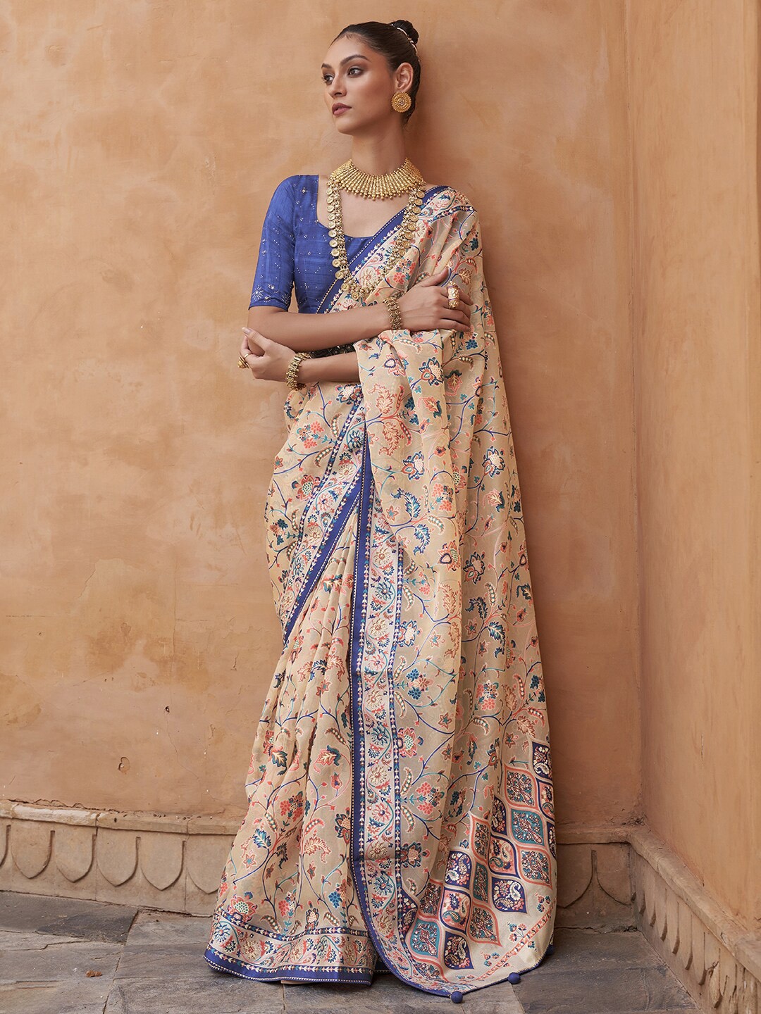 

Anouk Cream & Blue Ethnic Motifs Zari Organza Banarasi Saree