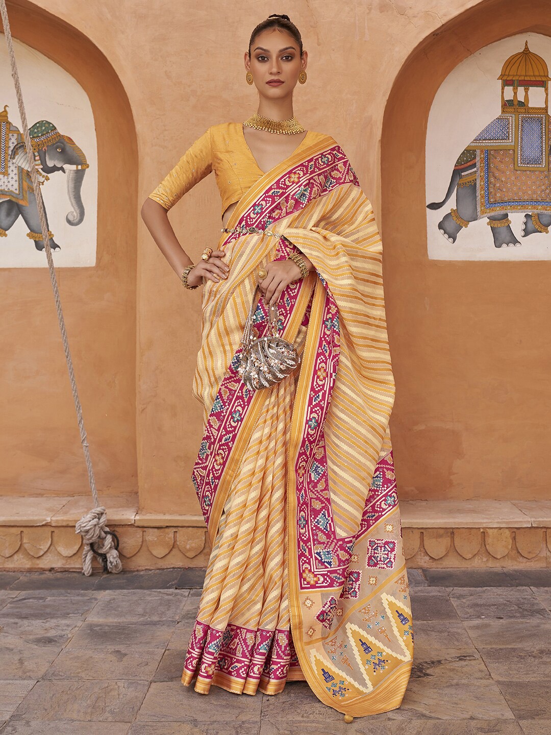 

Anouk Cream & Pink Leheriya Printed Zari Organza Banarasi Saree