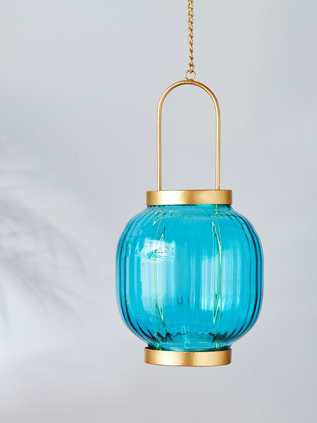 

Home Centre Teal Blue & Beige Hanging T-light Candle Holder