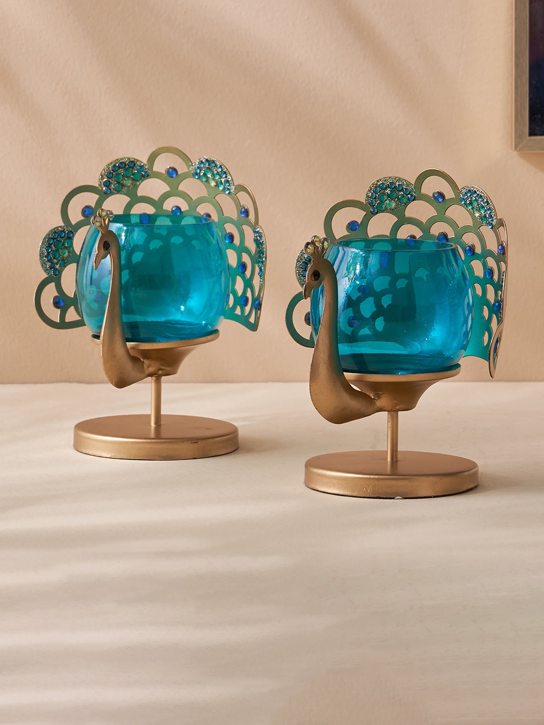 

Home Centre Teal Blue & Gold Toned 2 Pieces Peacock T-Light Candle Holder