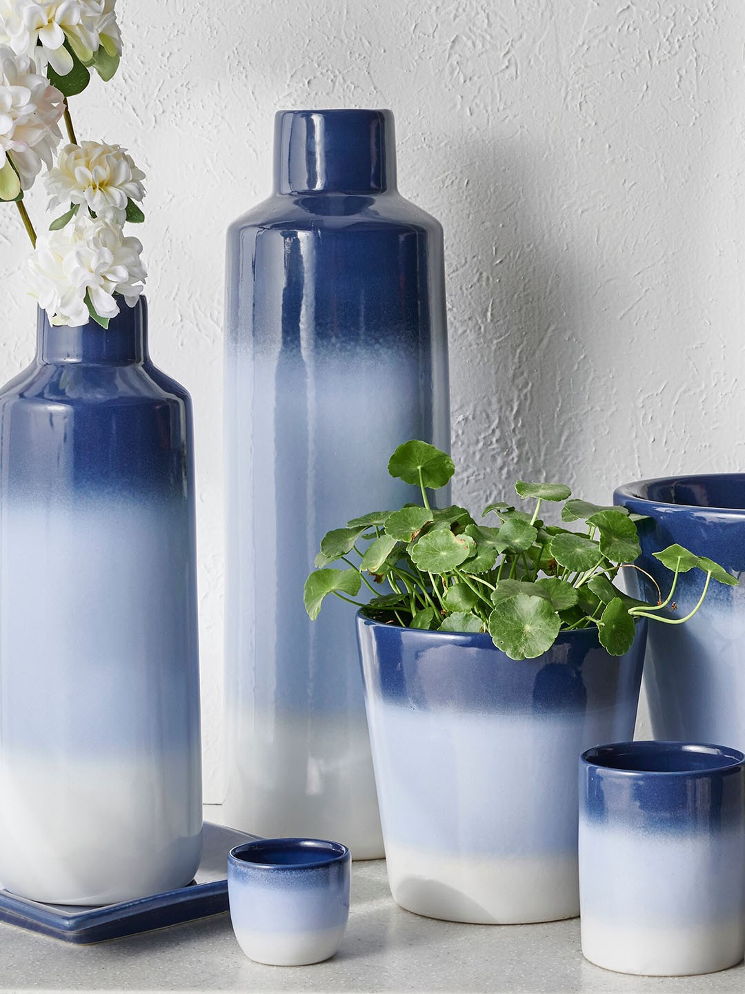 

Home Centre Blue Ombre T-Light Holder