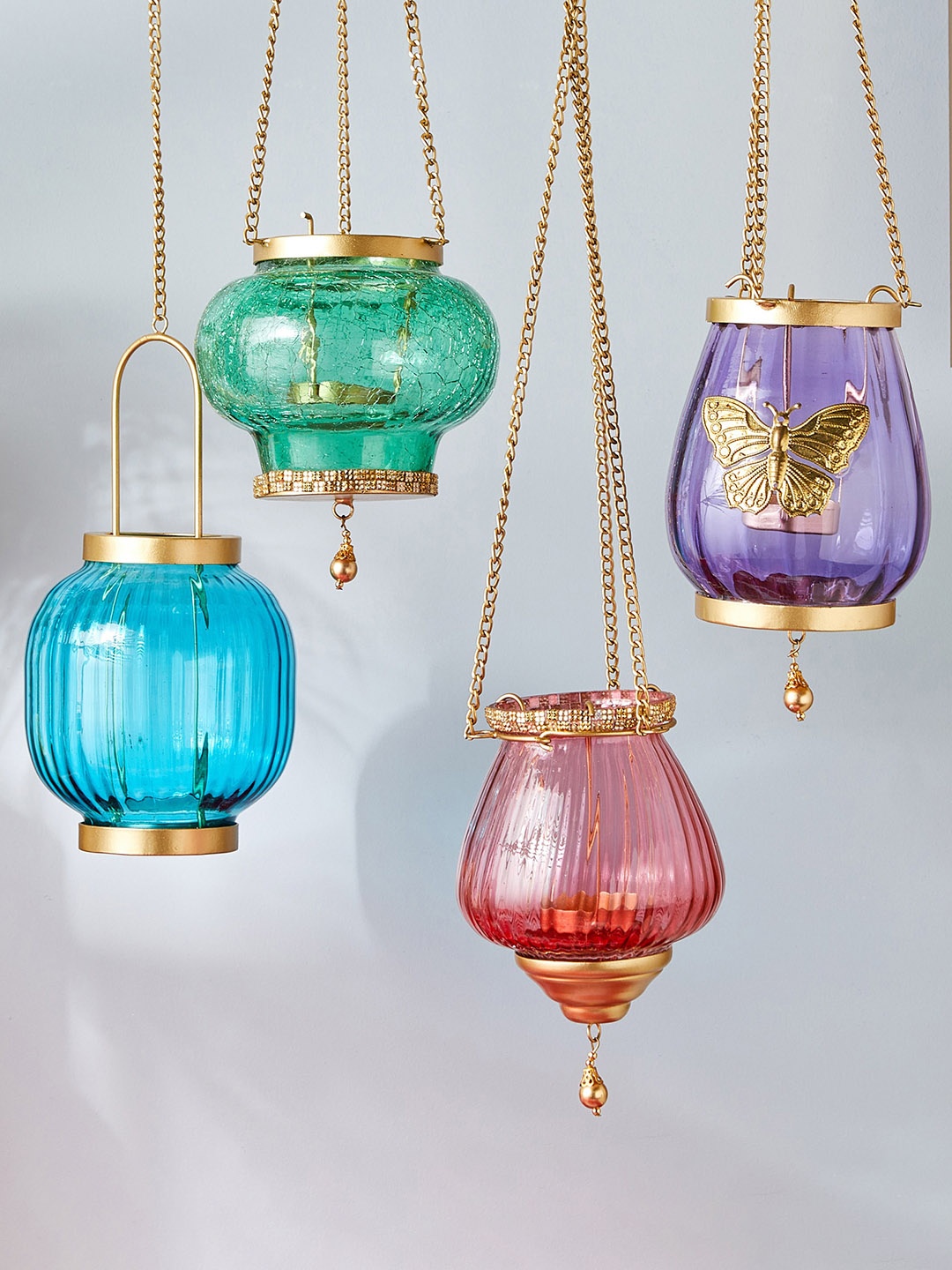 

Home Centre Green & Gold Toned Textured Glass Hanging T-Light Holder