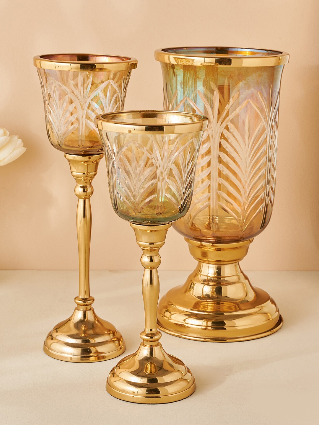 

Home Centre Gold Toned Etched Votive Light Holder