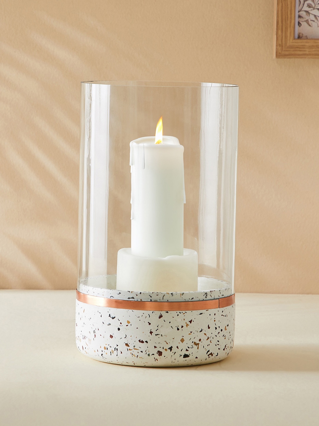 

Home Centre Splendid Transparent & White Printed Candle Holder