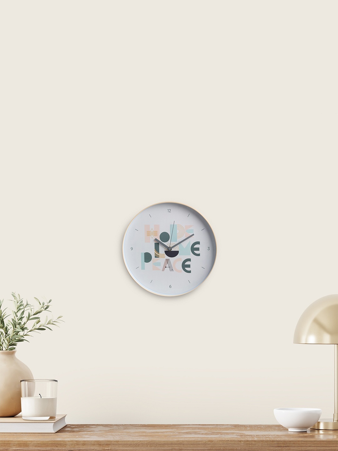 

Home Centre White & Green Printed Traditional Wall Clock