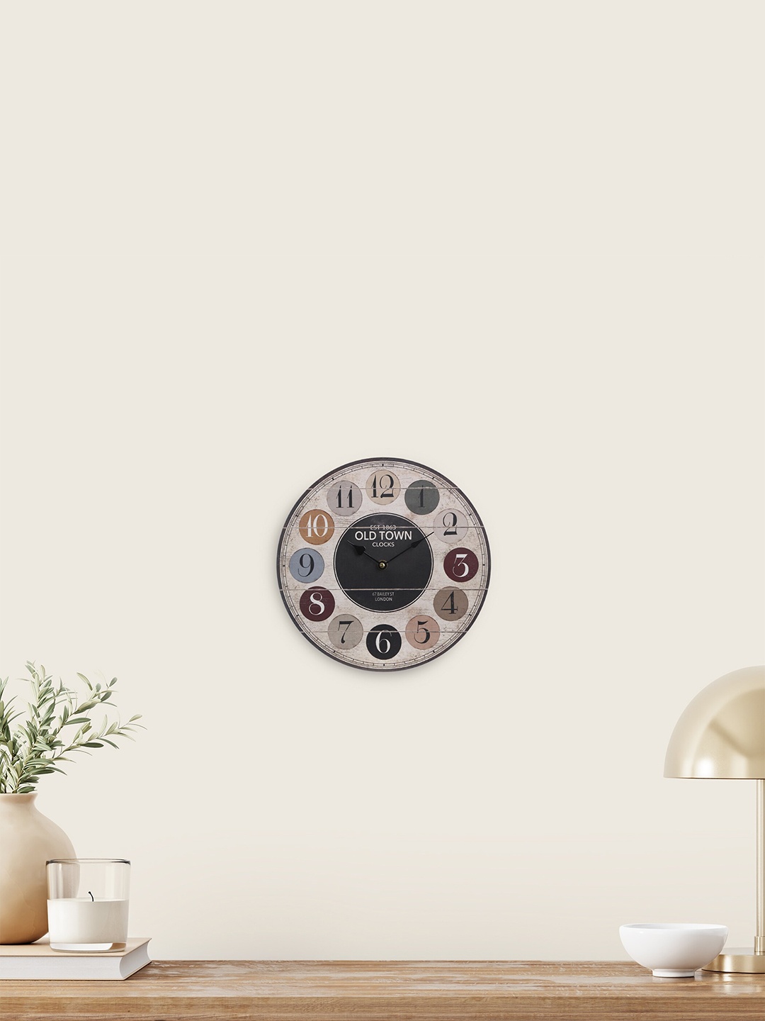 

Home Centre Brown & Black Printed Vintage Wall Clock