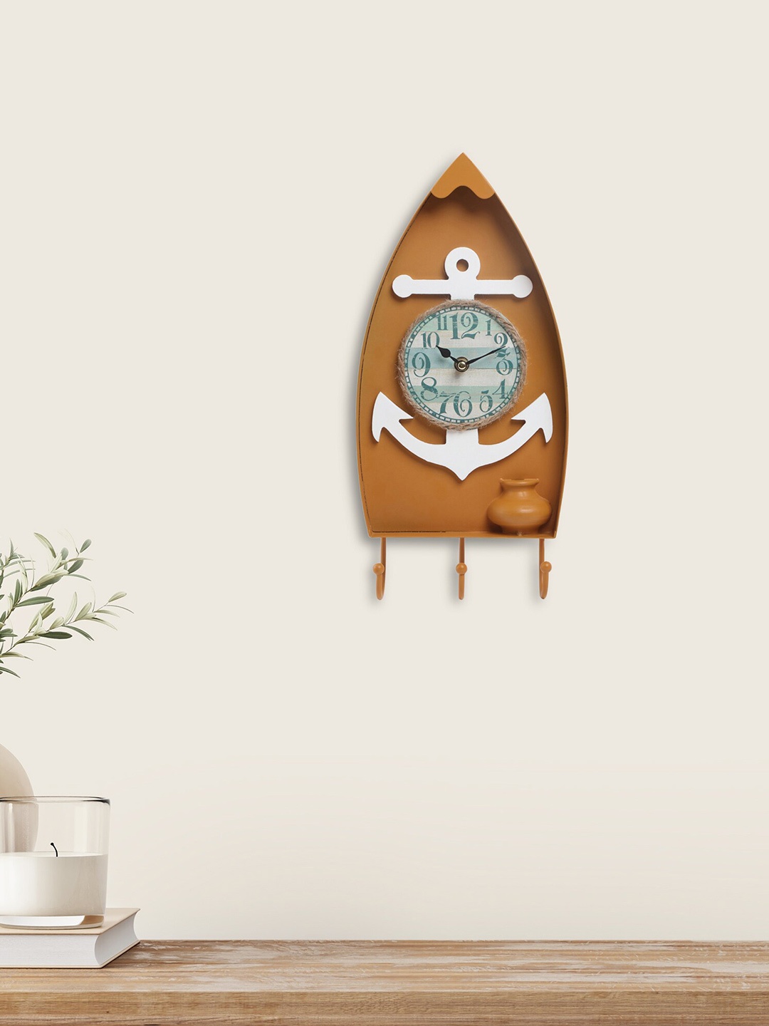 

Home Centre Brown Printed Abstract Shaped Contemporary Wall Clock