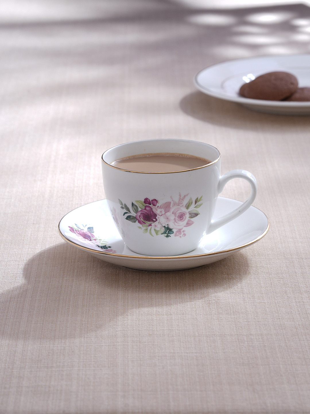 

Home Centre White & Pink Floral Printed Bone China Glossy Cups and Saucers Set-210ml