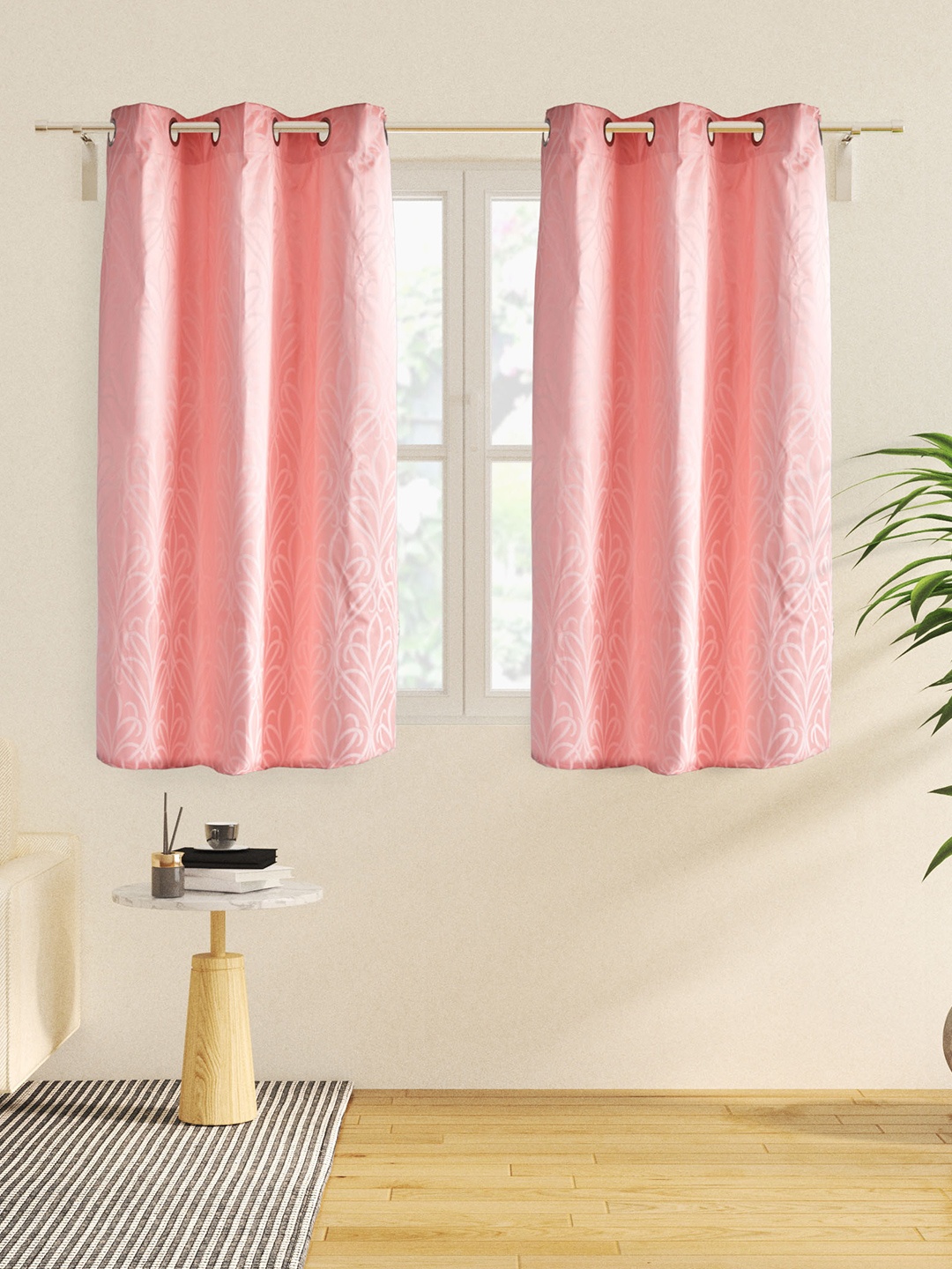 

Home Centre Pink 2 Pieces Floral Printed Black Out Window Curtains