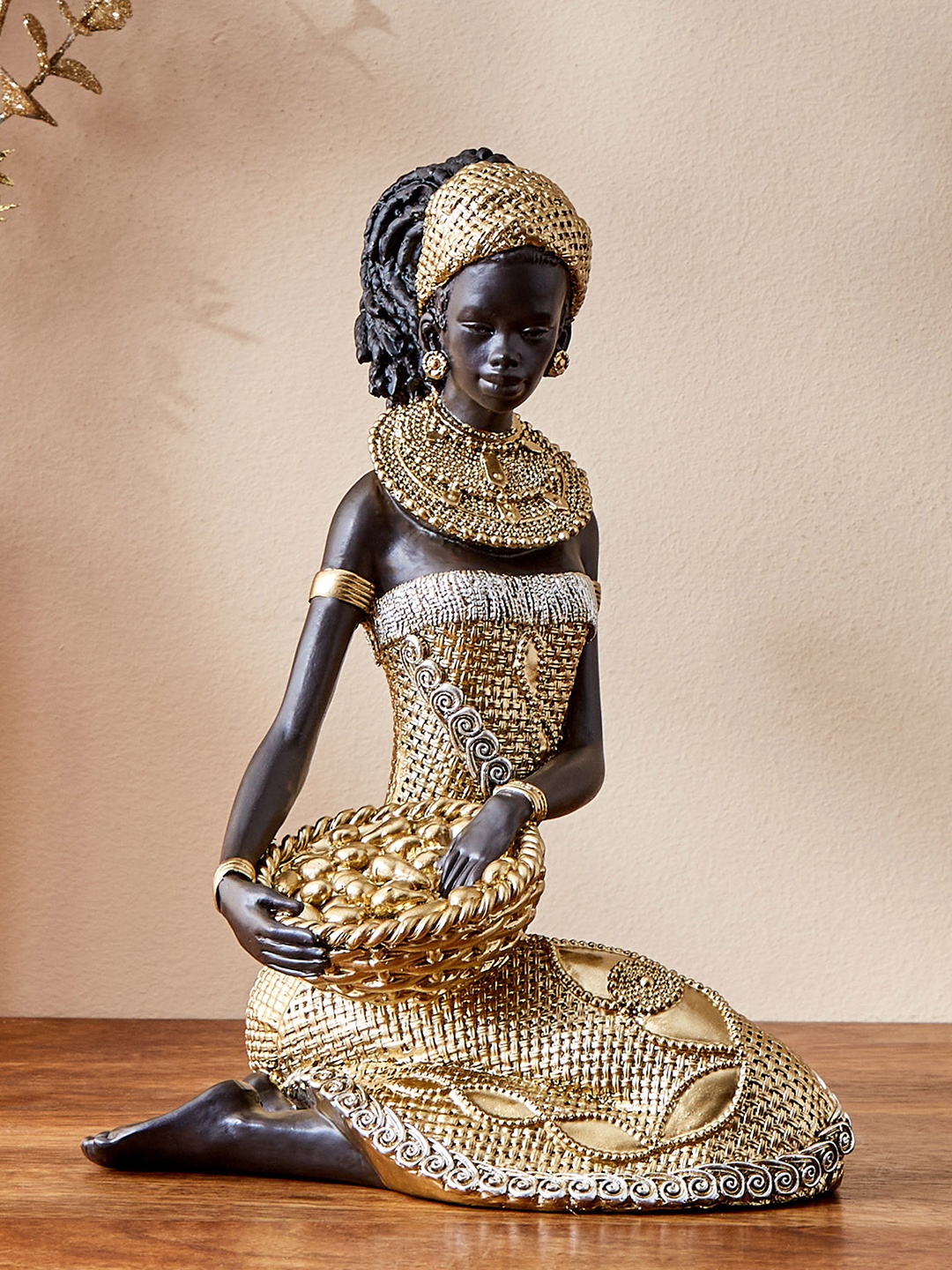 

Home Centre Black & Beige Lady With Basket Showpiece