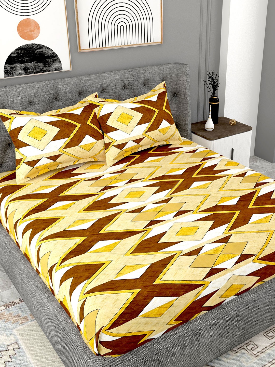 

Lali Prints Yellow & Brown Printed Cotton 180 TC King Bedsheet with 2 Pillow Covers