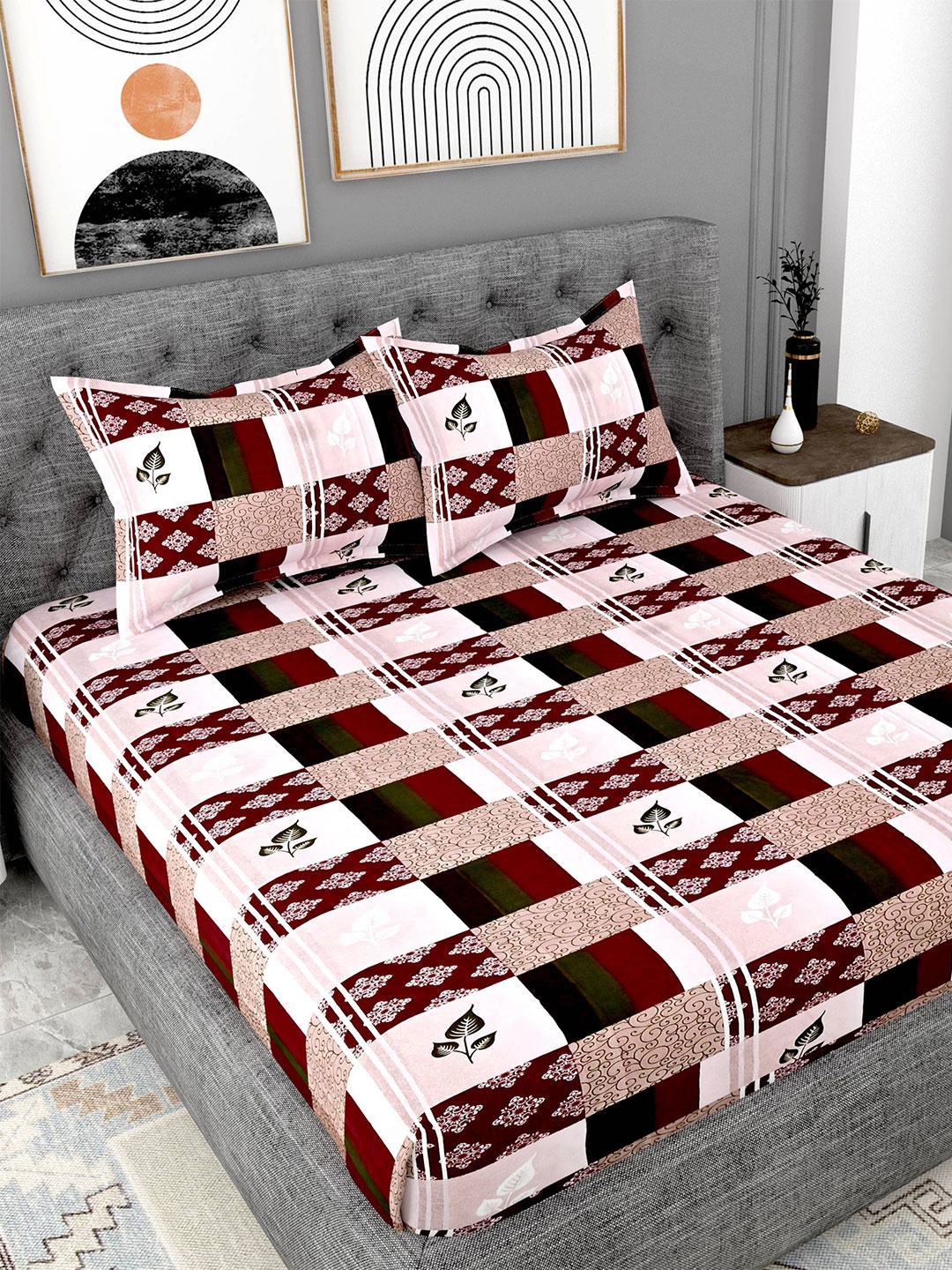 

Lali Prints Maroon & White Printed Cotton 180 TC King Bedsheet With 2 Pillow Covers